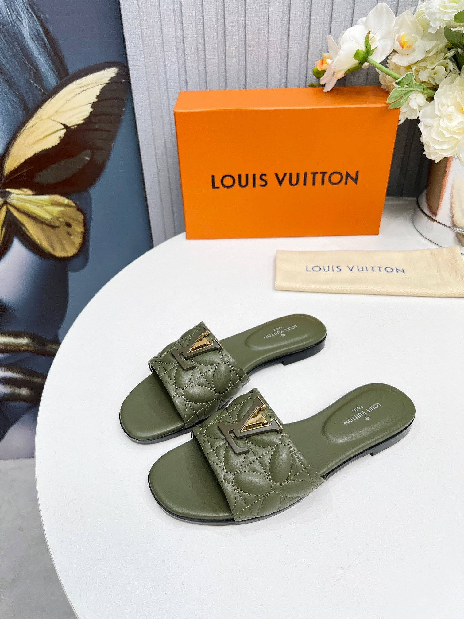LV 26S MARE FLAT MULES IN MOSS GREEN CALFSKIN