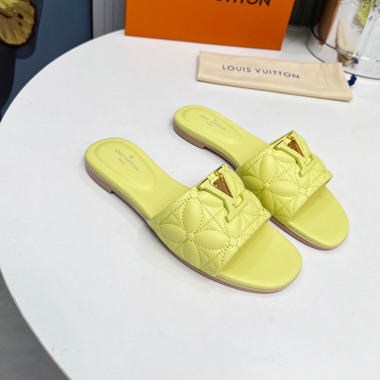 LV 26S MARE FLAT MULES IN LIGHT YELLOW CALFSKIN