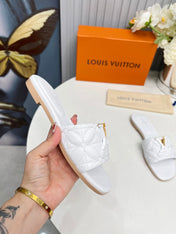 LV 26S MARE FLAT MULES IN WHITE CALFSKIN
