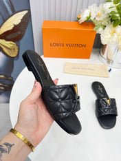 LV 26S MARE FLAT MULES IN BLACK CALFSKIN