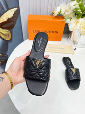 LV 26S MARE FLAT MULES IN BLACK CALFSKIN