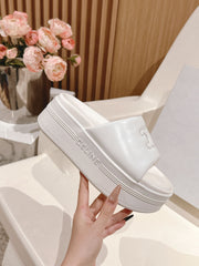 BLOCK SLIDE WITH TRIOMPHE IN WHITE SMOOTH LAMBSKIN