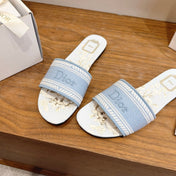 DIOR 26S FLAT SLIDE SANDALS IN LIGHT BLUE CANVAS