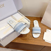 DIOR 26S FLAT SLIDE SANDALS IN LIGHT BLUE CANVAS
