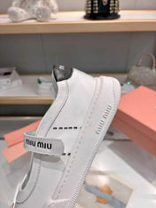 MIUMIU 26S MARY JANE BALLERINAS IN WHITE AND BLACK CALFSKIN