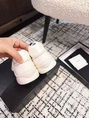 CLASSIC SNEAKERS IN WHITE SHEEPSKIN