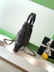 CHANEL 25S MAXI BOW BAG 38 IN DARK GREY DENIM WITH GOLD HARDWARE