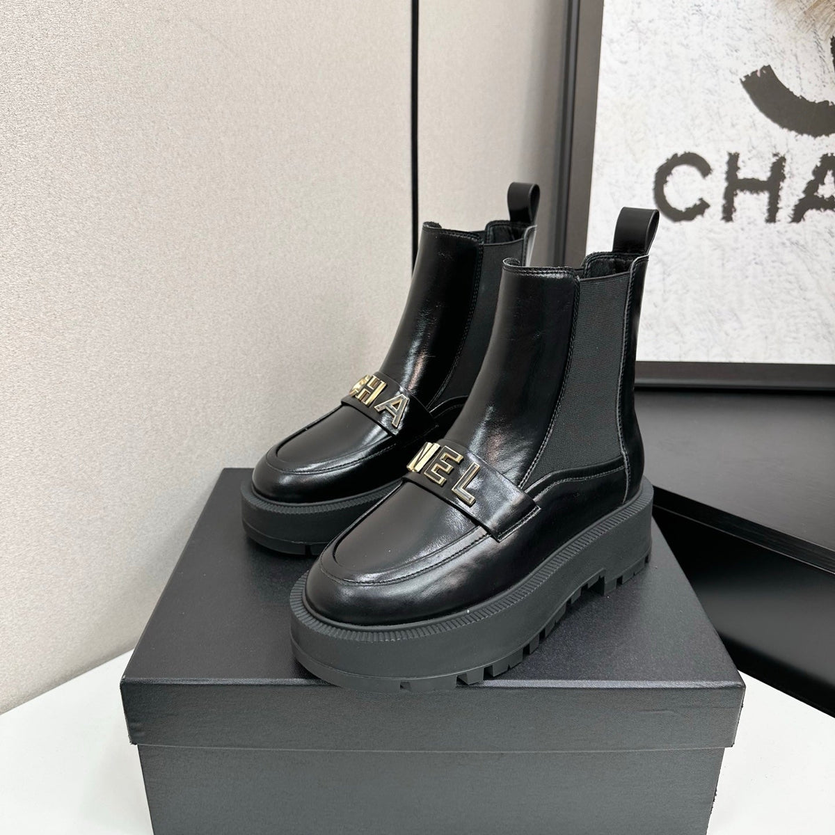 CHANEL 25S SHORT BOOTS IN BLACK CALFSKIN AND CANVAS
