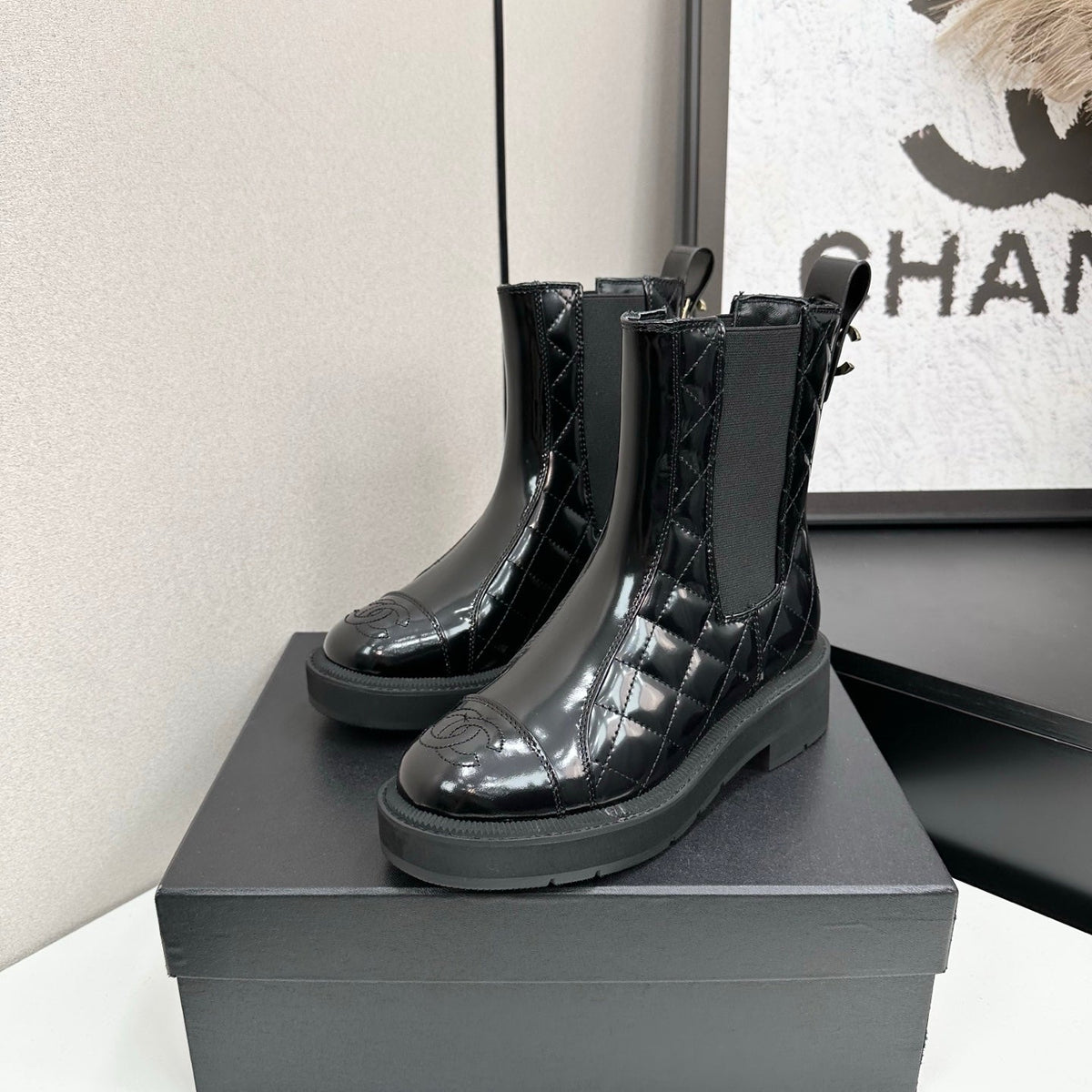 CHANEL 25S ELASTIC CHELSEA BOOTS IN BLACK GLOSSY CALFSKIN