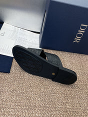 DIOR 25S ALIAS CROSS-STRAP SLIDES IN BLACK CALFSKIN