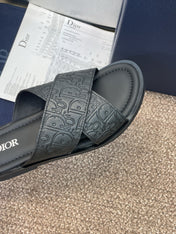 DIOR 25S ALIAS CROSS-STRAP SLIDES IN BLACK CALFSKIN