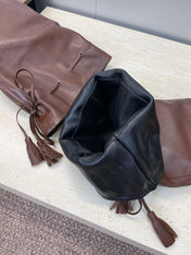 YSL 25S HIGH‑HEEL FRINGED MARTIN BOOTS 90 MM IN DARK BROWN LAMBSKIN