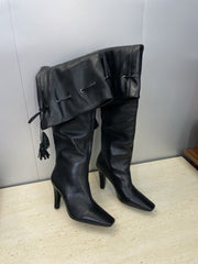 YSL 25S HIGH‑HEEL FRINGED MARTIN BOOTS 90 MM IN BLACK LAMBSKIN
