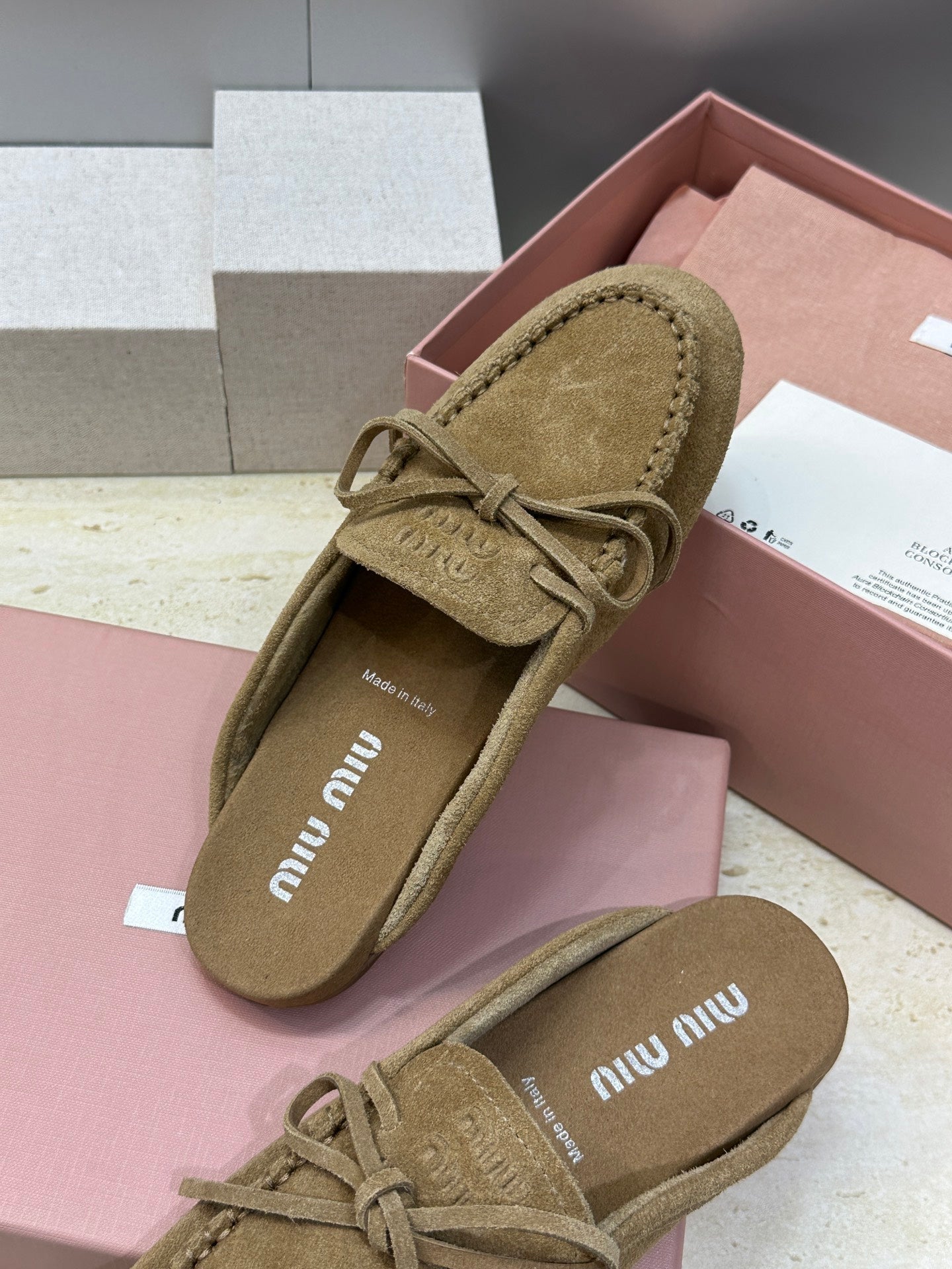 MIUMIU 26S SNEAKER MULES IN OLIVE BROWN SUEDE WITH BOW
