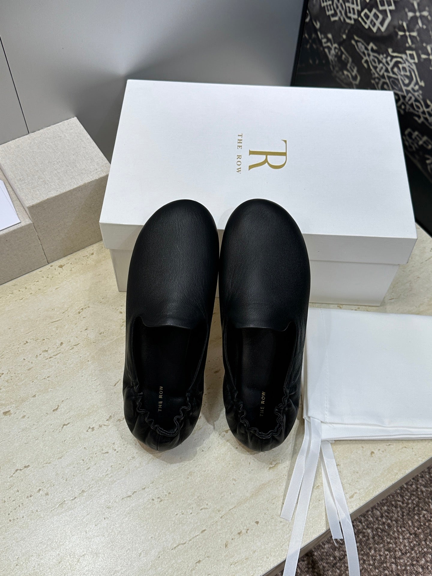 THE ROW 26S BALLET FLATS IN BLACK CALFSKIN