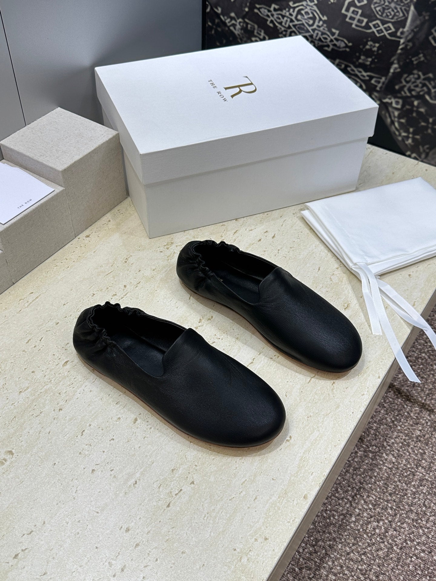 THE ROW 26S BALLET FLATS IN BLACK CALFSKIN