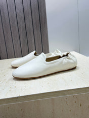 THE ROW 26S BALLET FLATS IN IVORY WHITE CALFSKIN