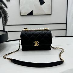 CHANEL 25S FLAP BAG 19 CM IN BLACK LAMBSKIN WITH PEARL TOP HANDLE