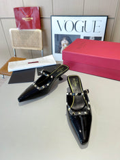 ROCKSTUD CAGED MULES 5 CM IN BLACK CALFSKIN