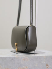 MINI VOLTAIRE IN BOX 17 IN KOMBU GREEN CALFSKIN GOLD LOGO