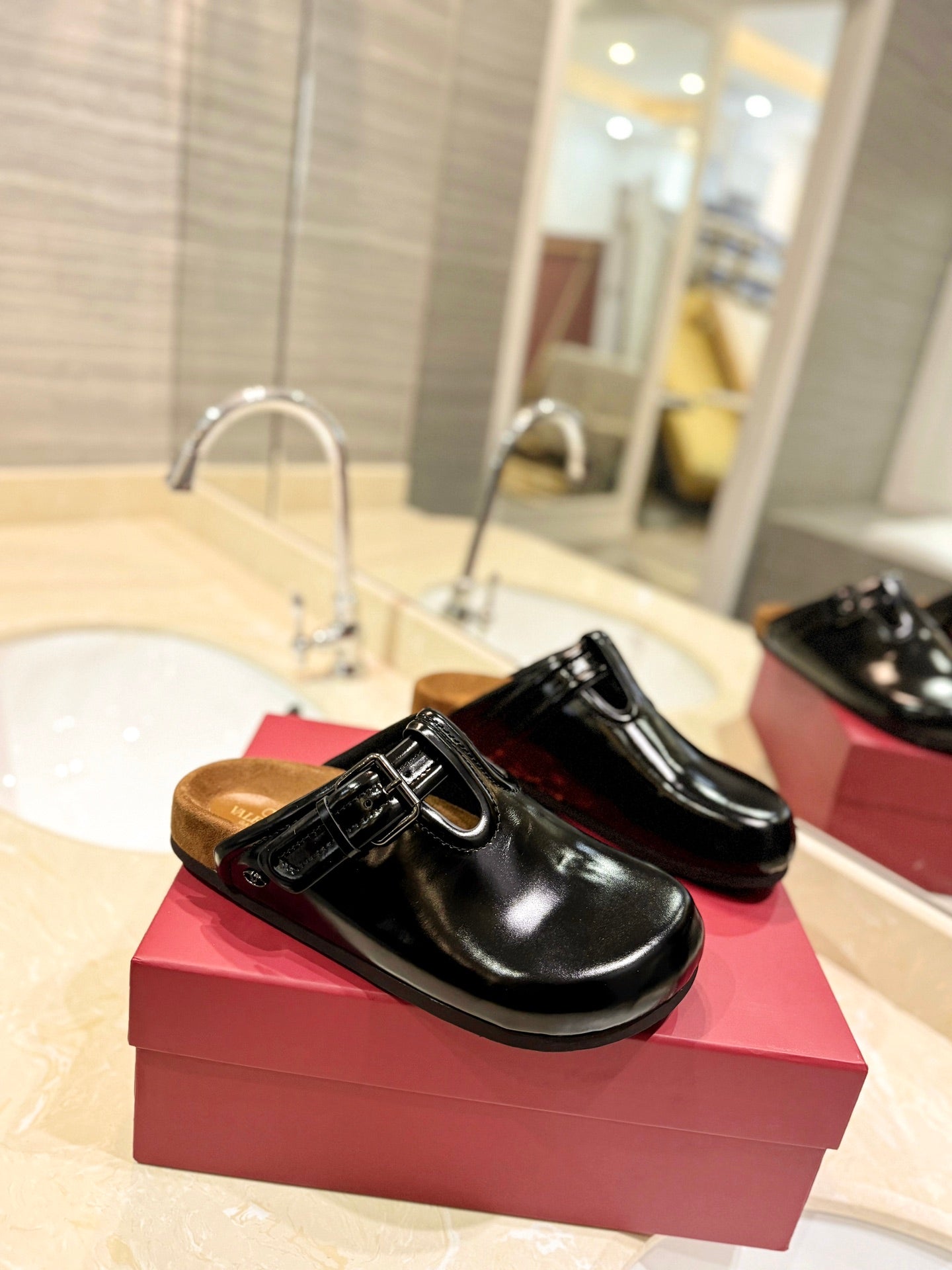 VALENTINO 26S FLAT MULES IN BLACK PATENT CALFSKIN