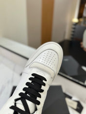 MID-TOP SNEAKERS IN WHITE AND BLACK TRIM PERFORATED LAMBSKIN