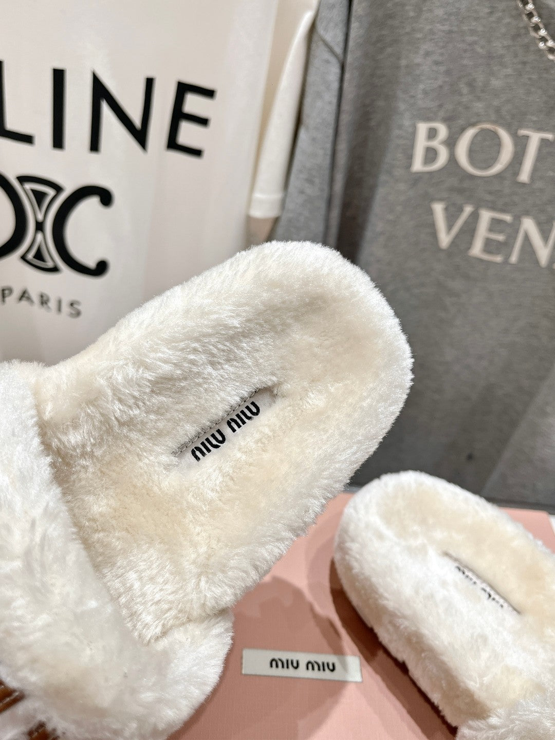 MIUMIU 26S FLAT SLIDES IN CREAM BEIGE SHEARLING