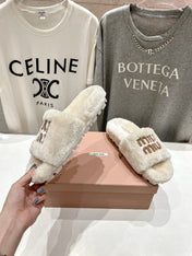 MIUMIU 26S FLAT SLIDES IN CREAM BEIGE SHEARLING