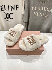 MIUMIU 26S FLAT SLIDES IN CREAM BEIGE SHEARLING
