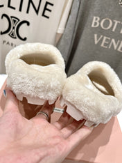 MIUMIU 26S FLAT SLIDES IN CREAM BEIGE SHEARLING