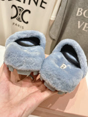 MIUMIU 26S FLAT SLIDES IN PASTEL BLUE SHEARLING