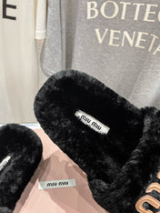 MIUMIU 26S FLAT SLIDES IN BLACK SHEARLING