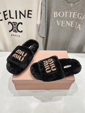 MIUMIU 26S FLAT SLIDES IN BLACK SHEARLING