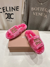 MIUMIU 26S FLAT SLIDES IN PINK SHEARLING