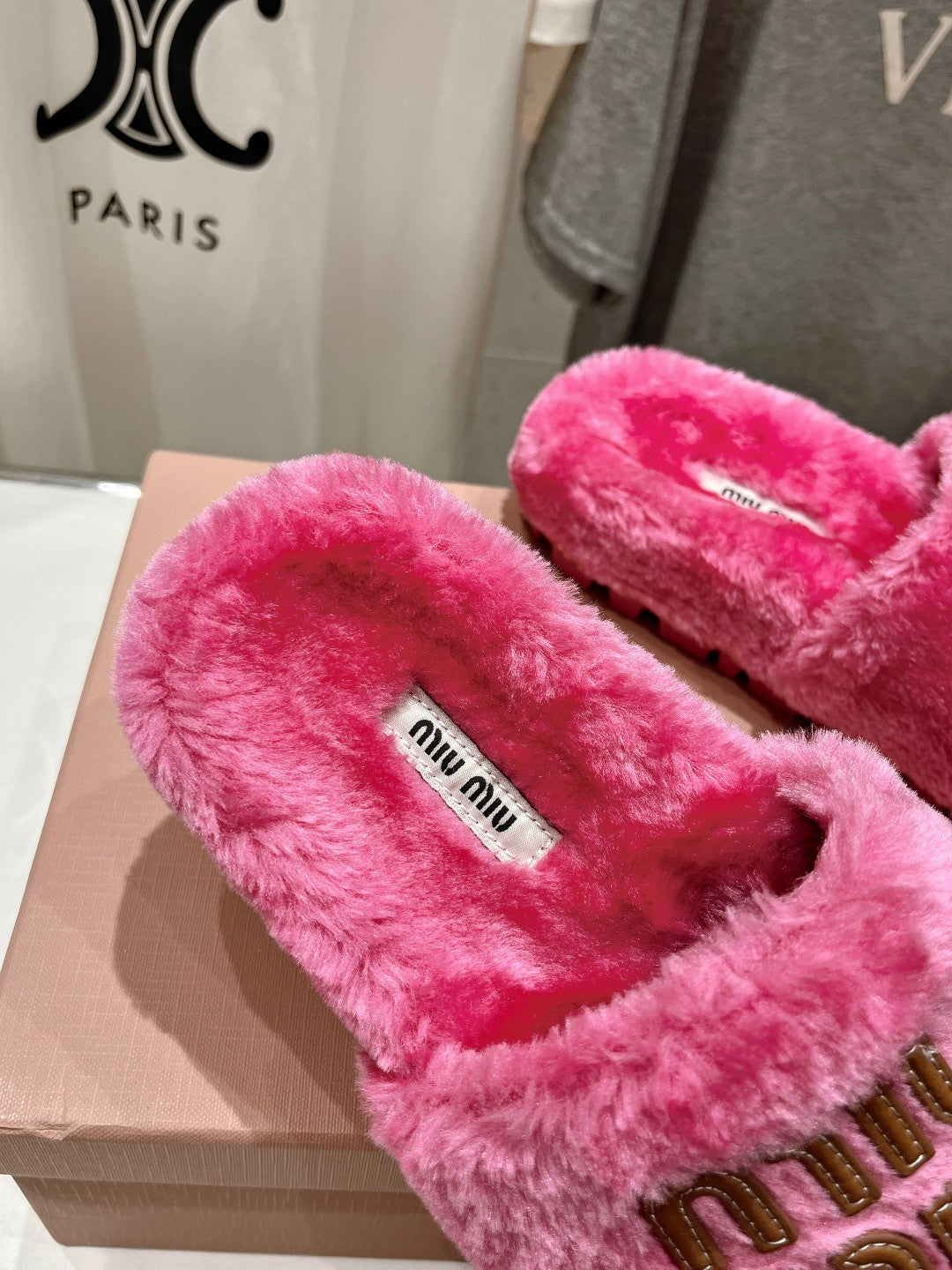 MIUMIU 26S FLAT SLIDES IN PINK SHEARLING