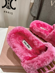 MIUMIU 26S FLAT SLIDES IN PINK SHEARLING