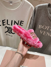 MIUMIU 26S FLAT SLIDES IN PINK SHEARLING