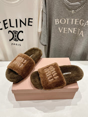 MIUMIU 26S FLAT SLIDES IN BROWN SHEARLING