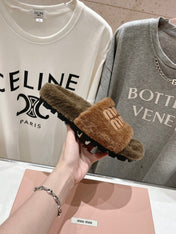 MIUMIU 26S FLAT SLIDES IN BROWN SHEARLING