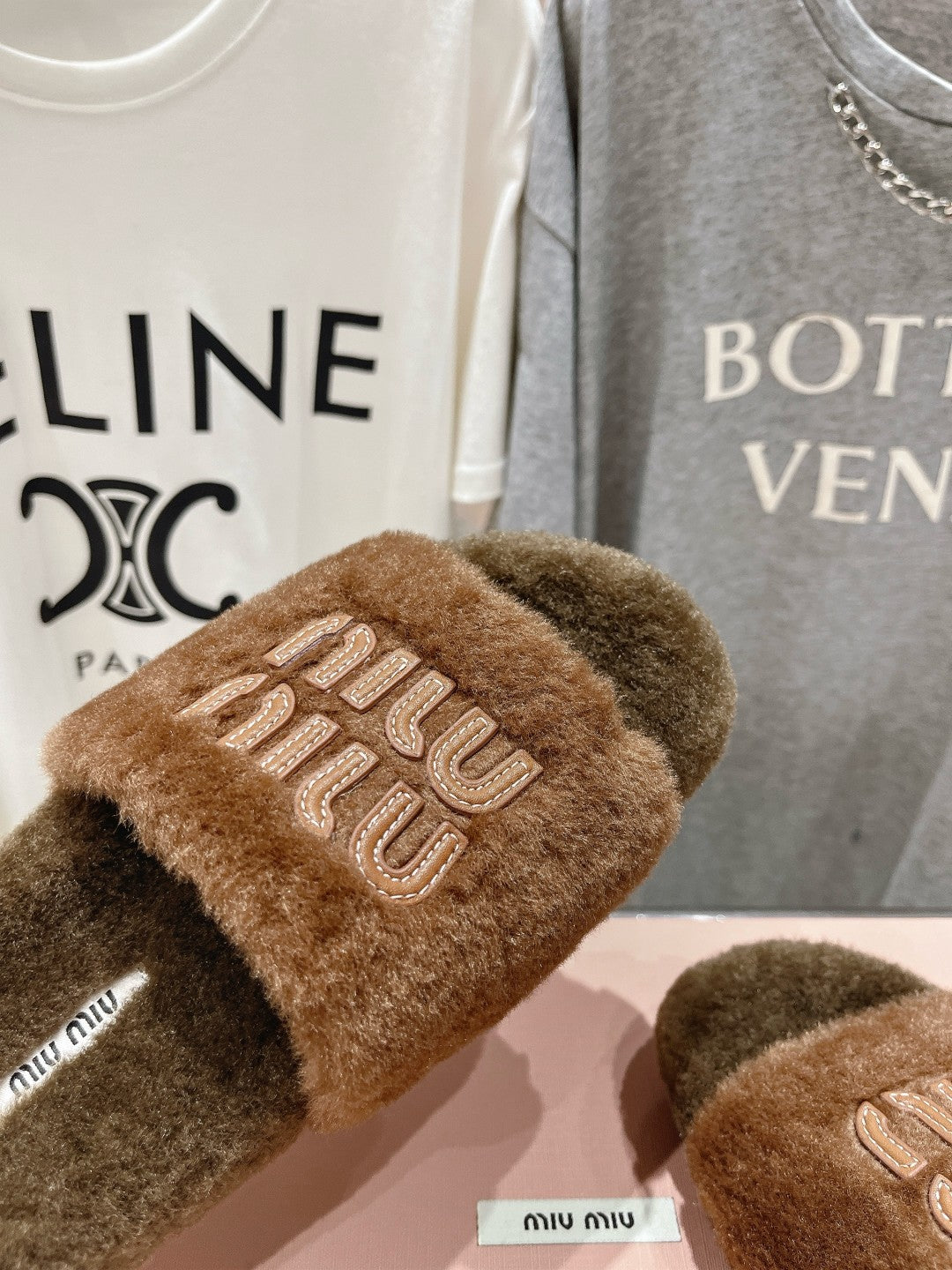 MIUMIU 26S FLAT SLIDES IN BROWN SHEARLING
