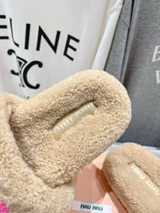 MIUMIU 26S SANDALS IN LIGHT BEIGE SHEARLING WITH LOGO LETTERING
