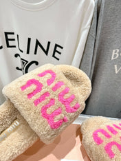MIUMIU 26S SANDALS IN LIGHT BEIGE SHEARLING WITH LOGO LETTERING