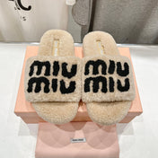 MIUMIU 26S SANDALS IN BEIGE SHEARLING WITH LOGO LETTERING