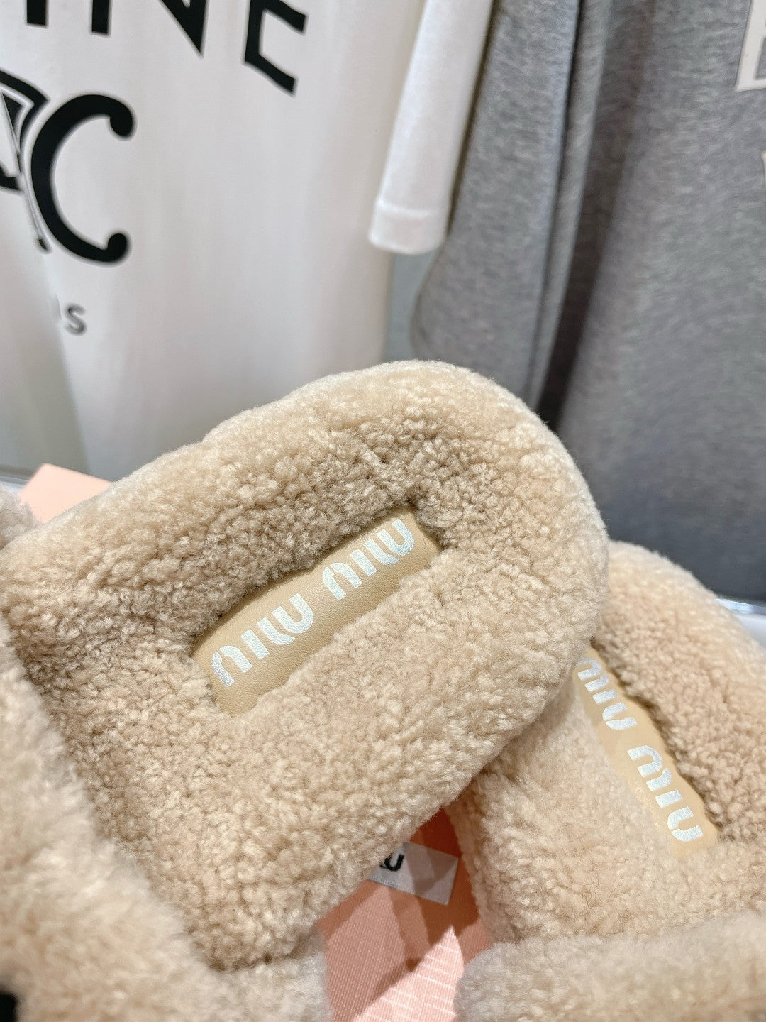 MIUMIU 26S SANDALS IN BEIGE SHEARLING WITH LOGO LETTERING