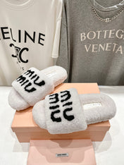 MIUMIU 26S SANDALS IN CREAM WHITE SHEARLING WITH LOGO LETTERING
