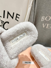 MIUMIU 26S SANDALS IN CREAM WHITE SHEARLING WITH LOGO LETTERING