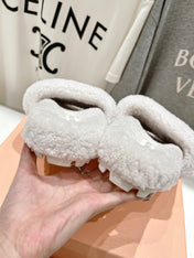MIUMIU 26S SANDALS IN CREAM WHITE SHEARLING WITH LOGO LETTERING