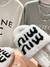 MIUMIU 26S SANDALS IN CREAM WHITE SHEARLING WITH LOGO LETTERING