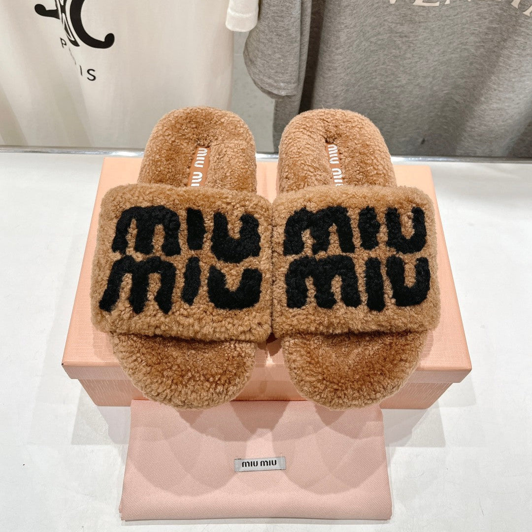 MIUMIU 26S SANDALS IN LIGHT BROWN SHEARLING WITH LOGO LETTERING