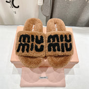 MIUMIU 26S SANDALS IN LIGHT BROWN SHEARLING WITH LOGO LETTERING